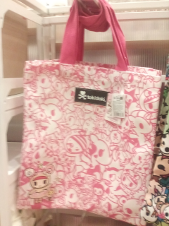 Pink and white tokidoki bag.